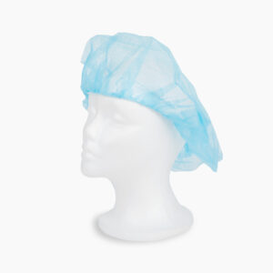 Blue disposable bouffant cap on a mannequin head.