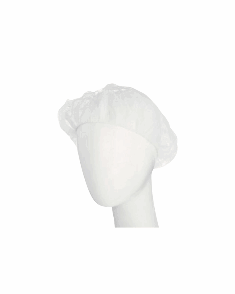 White disposable bouffant cap on mannequin head.