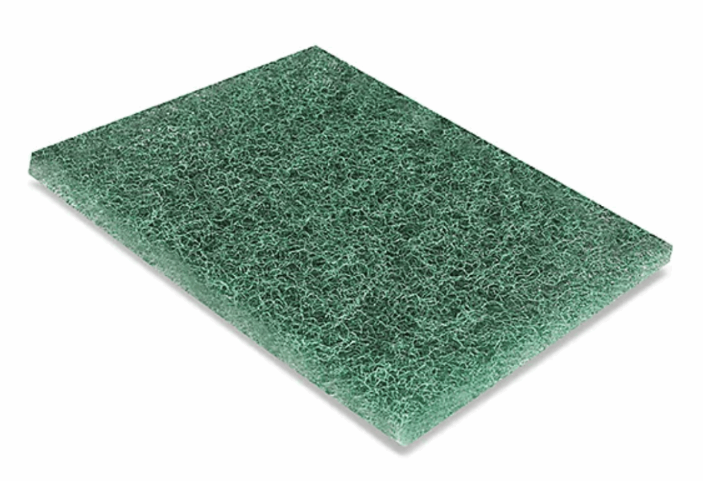 Green scouring pad with a textured surface.