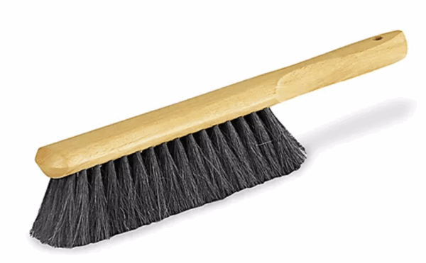 Wooden handle brush with black bristles.